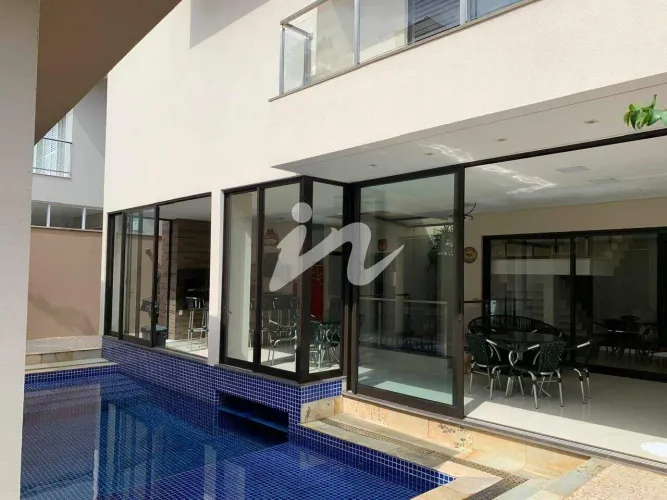 Casa com 4 dormitórios à venda, 396 m² por R$ 3.900.000 - Jardins Gênova - Uberlândia/MG