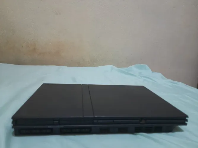 Playstation 2 com 2 controles, pendrive e memóry card 