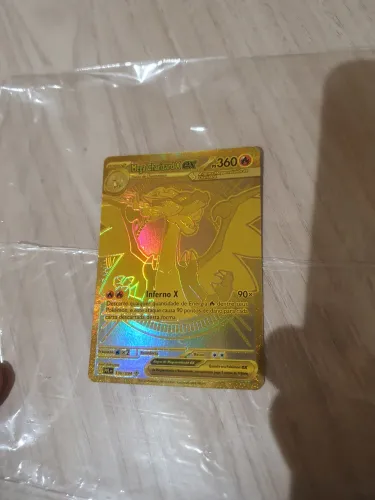 Carta pokemon Mega Charizard X dourada