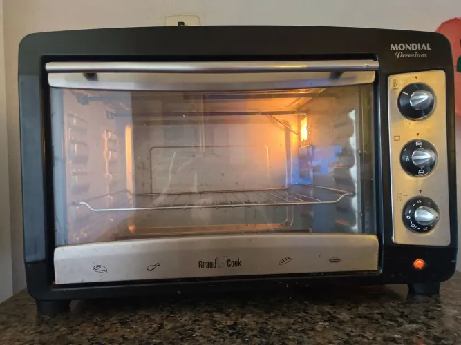 Forno elétrico 42 litros só está esquentando a parte de cima bem conservado 