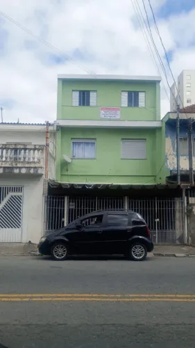 Sobrado com 3 casas para investimento
