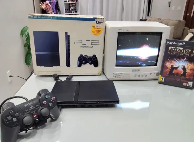 PlayStation 2 caixa com serial batendo acessórios originais 