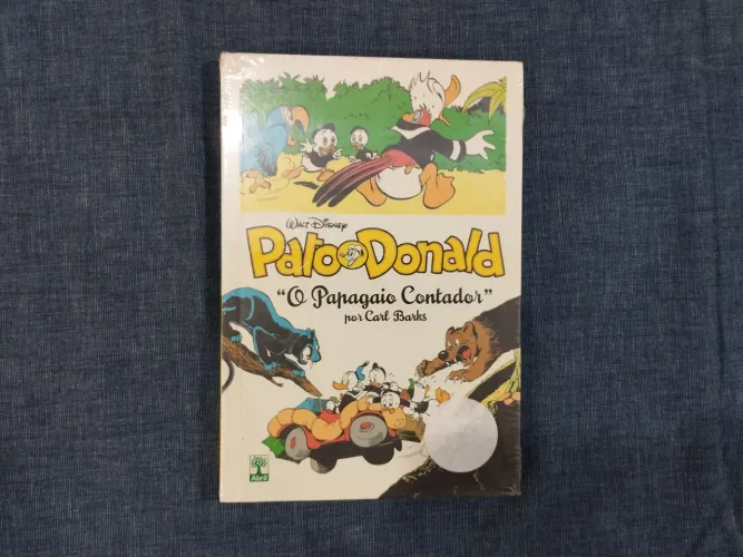 PATO DONALD - O PAPAGAIO CONTADOR (CAPA DURA)
