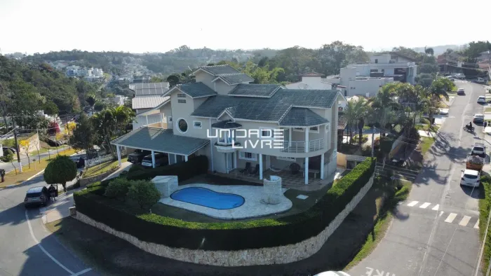 Casa 4 Suítes no Ecopark 655m², Piscina e Área Gourmet