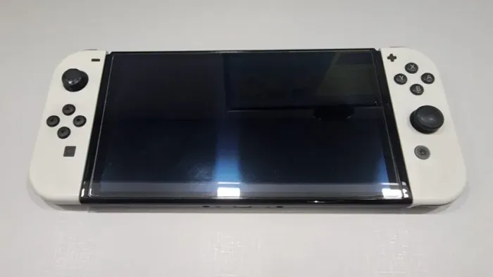 Nintendo Switch Oled + Película + Bolsa + Controles e todos os acessórios originais