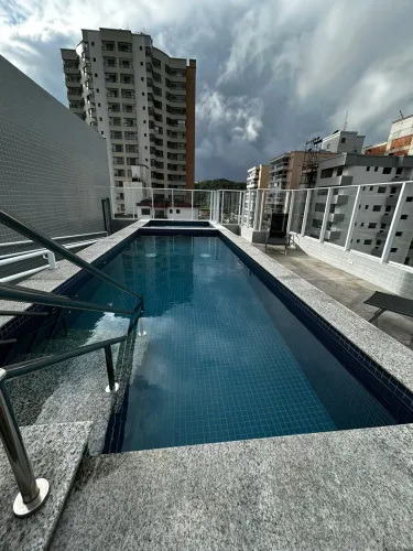 Apartamento com 2 dormitórios, sacada com Churrasqueira, Prédio NOVO no Canto do FORTE - F