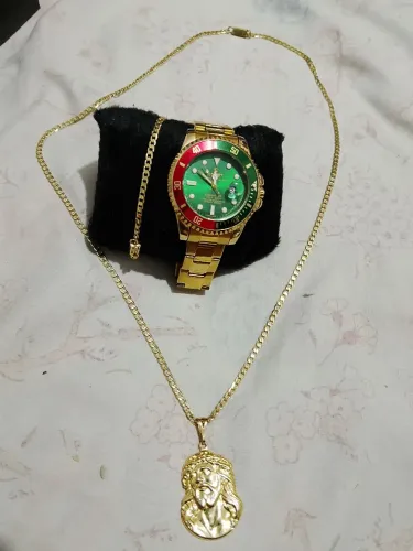 Vende-se kit, relógio pulseira e cordão moeda antiga.