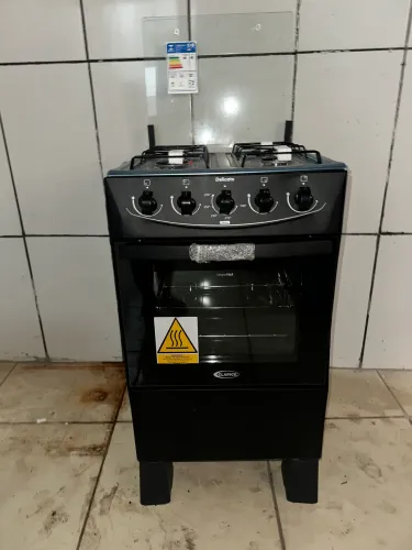 Vendo fogão 4 bc Delicato, novo , nunca usado