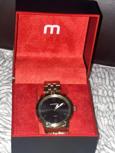 Relógio mondaine masculino dourado original