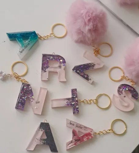 Chaveiros personalizado com sua inicial apati de 15reais