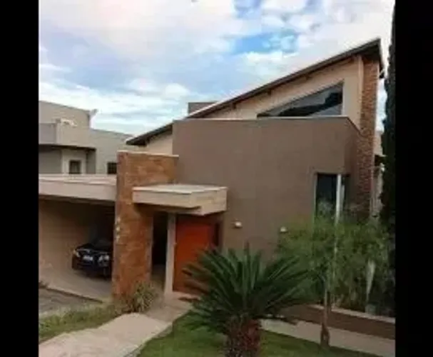 Casa de condomínio para venda possui 344 metros quadrados com 5 quartos