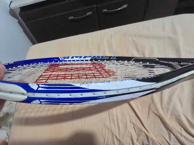 Raquete de tenis wilson impact