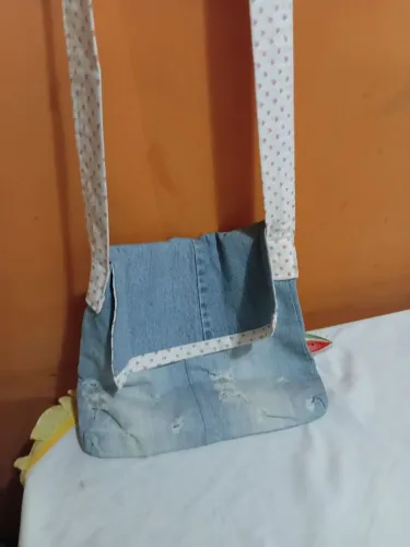 Bolsa carteiro jeans.