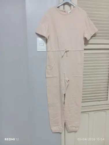 Macacão salmão feminino (ZARA) VESTE 13-14 ANOS.