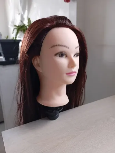 Cabeça de boneca para treino