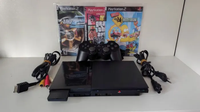 ?PLAYSTATION 2 SLIM BEM CONSERVADO ?