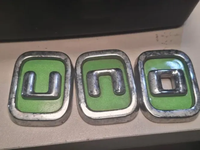 Emblema Sigla Uno Fiat Novo Uno 2011 2014 Original