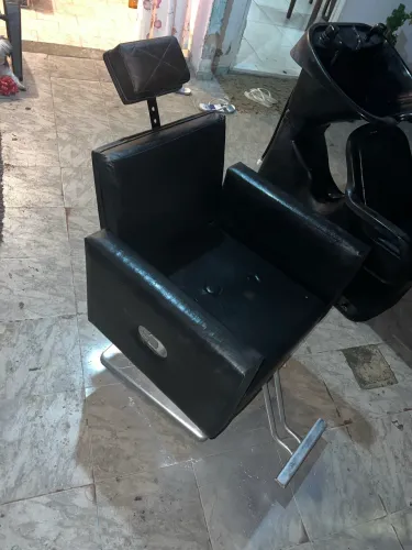 Lavatório e cadeira de salão
