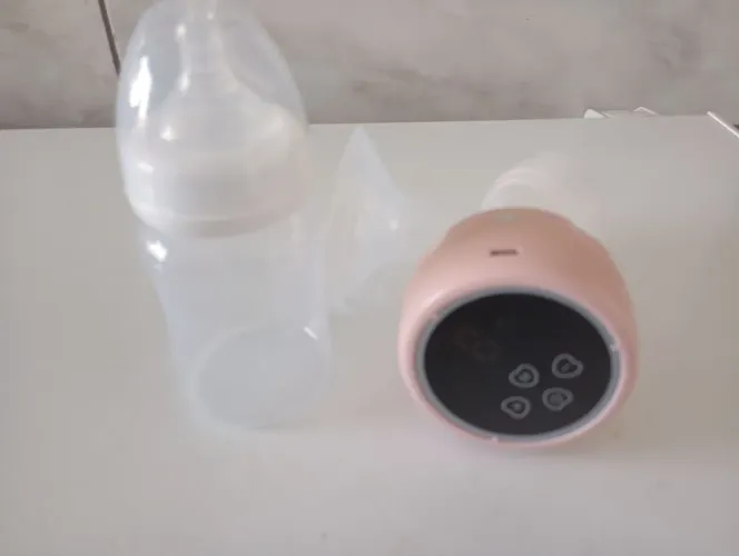 Bomba de tira leite mais doppler batimentos bebe