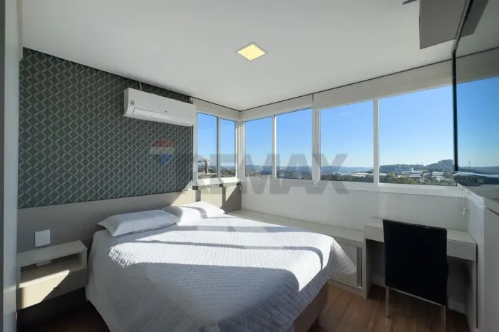 Apartamento semi-mobiliado de 2 dormitórios com suíte no Universitário