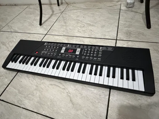 Vendo teclado musical de pilha! Seminovo