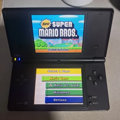 Nintendo DSi + New Super Mario Bros original + SD 16GB + Carregador