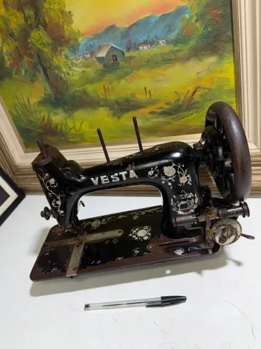 Máquina de costura antiga vesta decoração