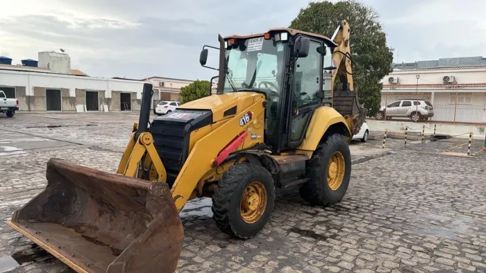 Retroescavadeira Cat 