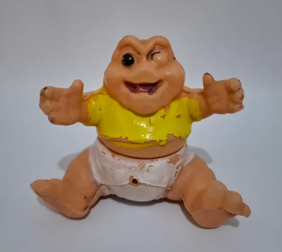 A Família Dinossauro Boneco Baby em plástico bolha Bootleg Vintage