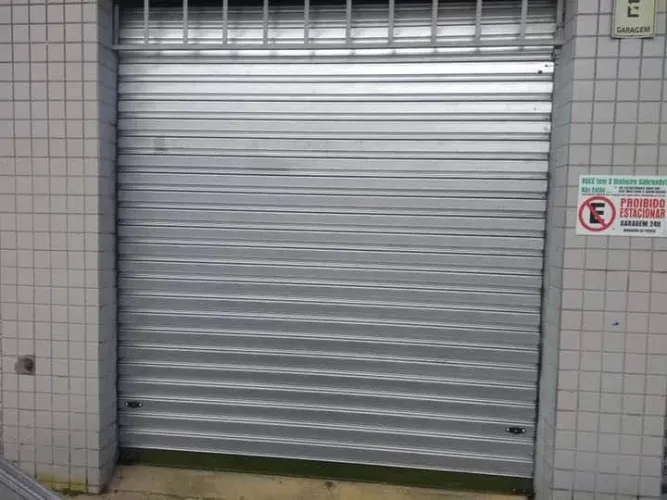 Concerto e manutenção de Porta de rolo 