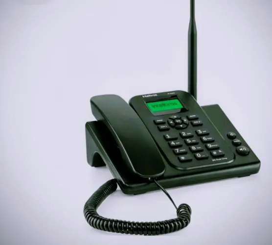Telefone celular pré pago fixo de mesa.