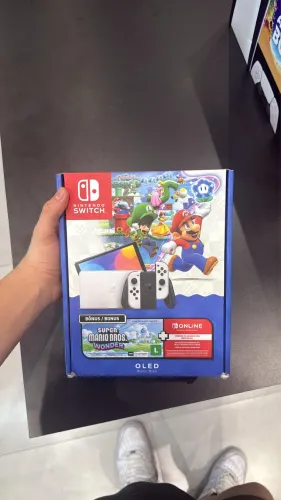 ? Nintendo Switch OLED Branco + Super Mario Bros Wonder + 3 Meses Online