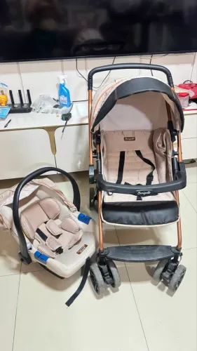 Carrinho de bebê + bebê conforto 