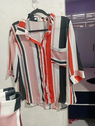 Conjunto social da marca Êxito.