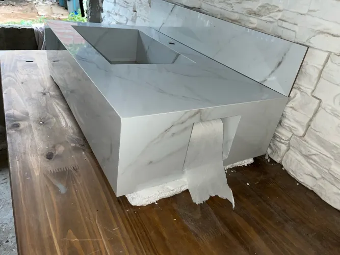 Lavatório esculpido em porcelanato 