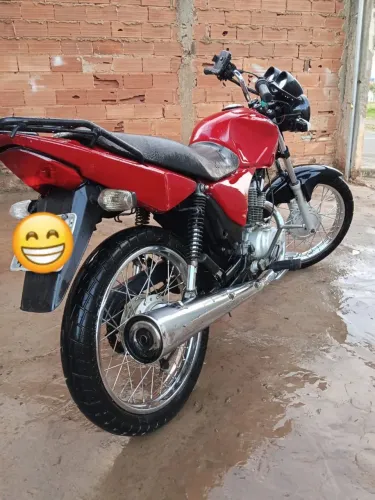 Titan 150 vermelha em dias 