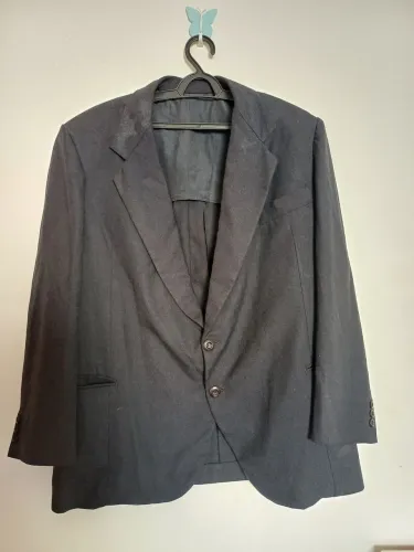 Blazer em linho, 46. Avaria leves manchas  destaque na foto.