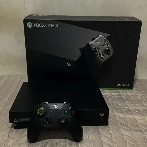 Xbox one X ssd 1tb venda ou troco, (leia a desc)
