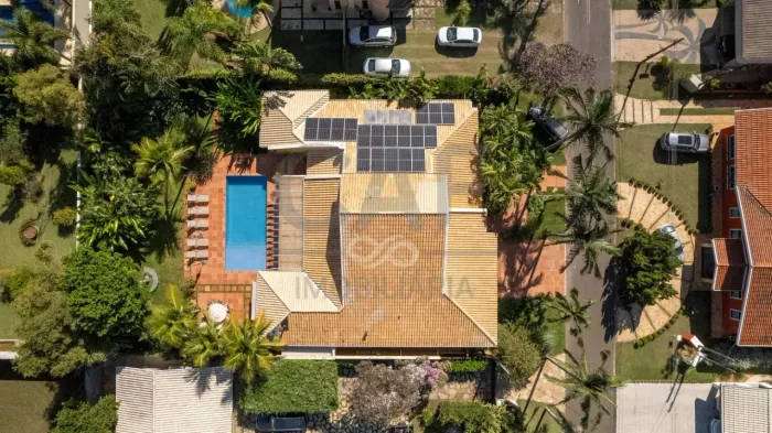 Casa com 4 dormitórios à venda, 405 m² por R$ 4.450.000,00 - Residencial Palm Park - Holam