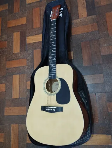 Violão vogga vck 401 NA. Cordas de aço. Junto com ele vai a capa. Venda somente a vista. 