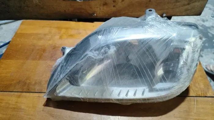 Farol esquerdo renault logan 2007 a 2011 recuperado