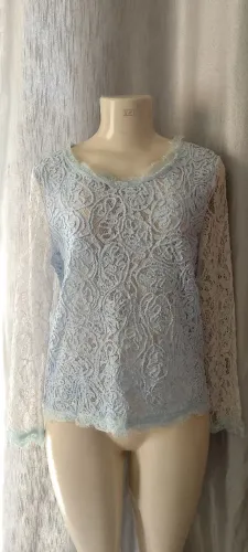Blusa de renda azul claro De R$30,00 por R$15,00 na promoção!