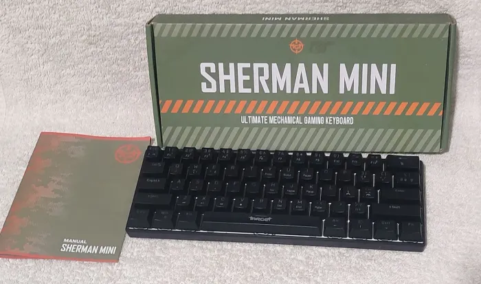Teclado sherman mini + Caixa original + manual.