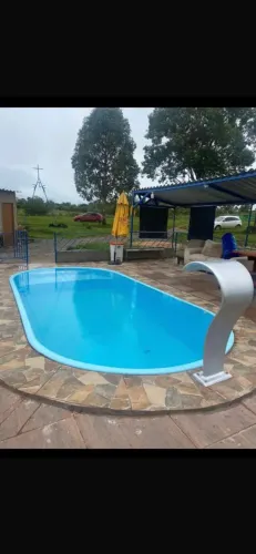 Piscina de fibra 6 metros instalada com Kit básico + Led + cascata