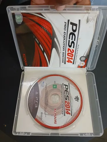 Jogo de ps3 original (pes 2014) com manual