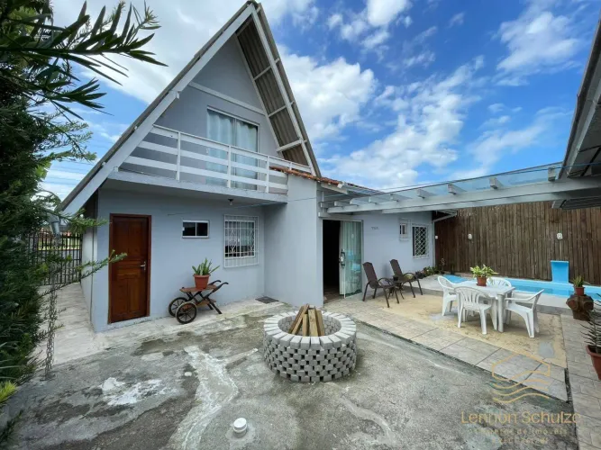 CASA COM 4 QUARTOS E ÁREA DE LAZER COMPLETA COM PISCINA A VENDA