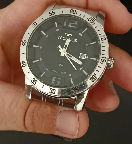 Belo relógio original TECHNOS máquina japonesa ,seminovo , vendo ou estudo trocas