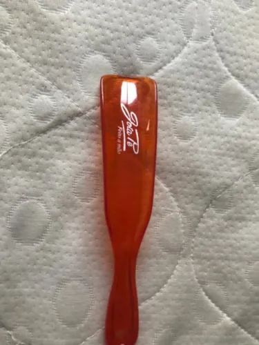 Calçadeira de plastico