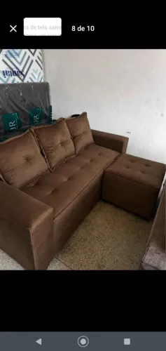 Sofá 3 lugares com puff centro
