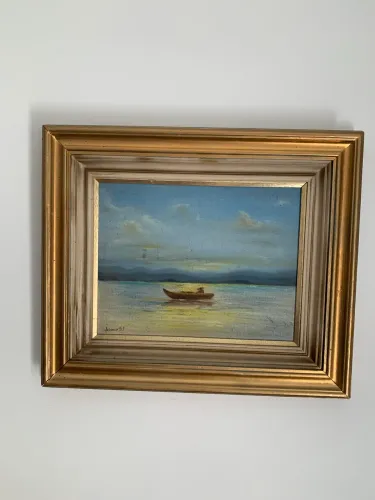 Quadro a óleo em moldura dourada
